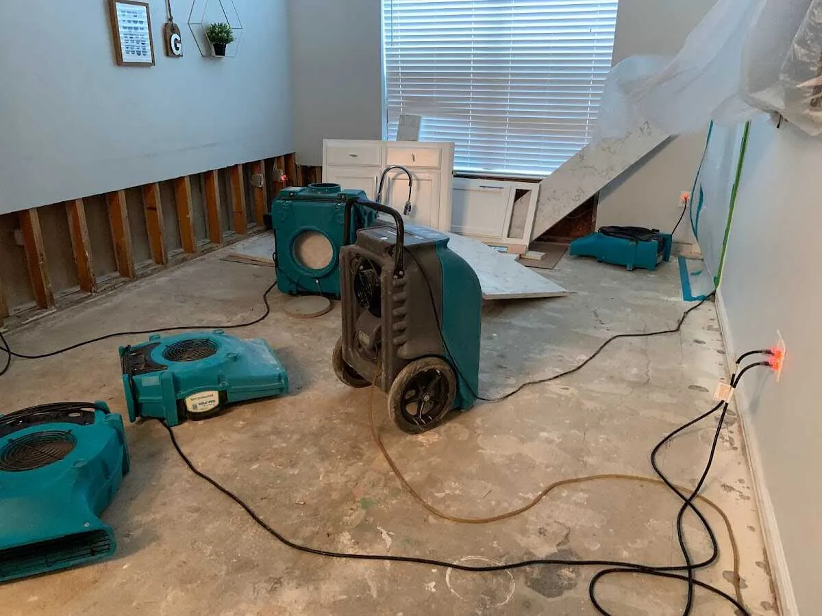 Dehumidifier in flood-cut room for Water Extraction & Removal in Charles City